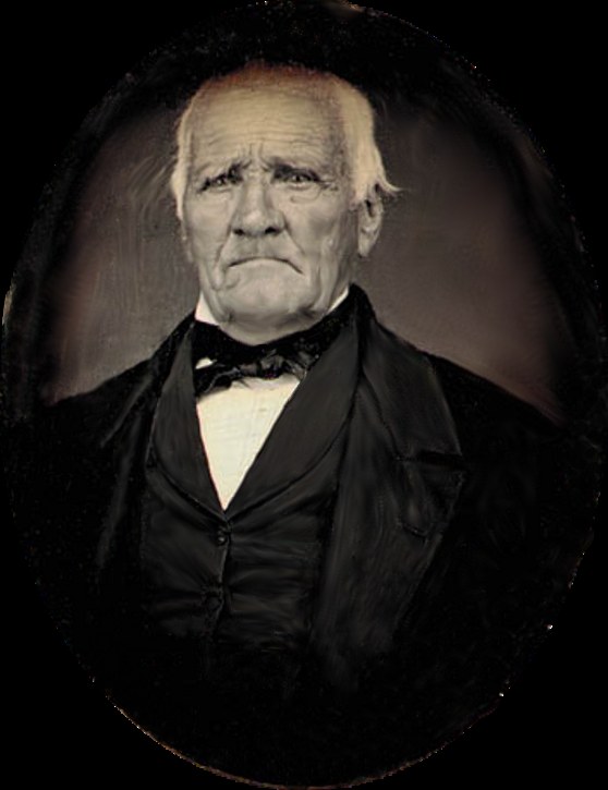 Sam Houston in 1863, an elderly man with white hair seated in a dark coat, in one of the last photographs taken of him.